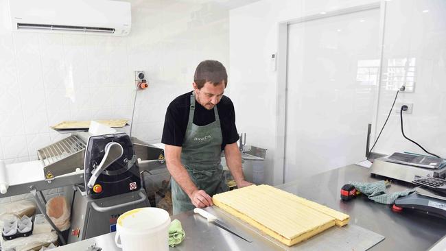 Jamie Flood behind the scenes at Meadow Bake Shop in Yandina. Picture: Patrick Woods.