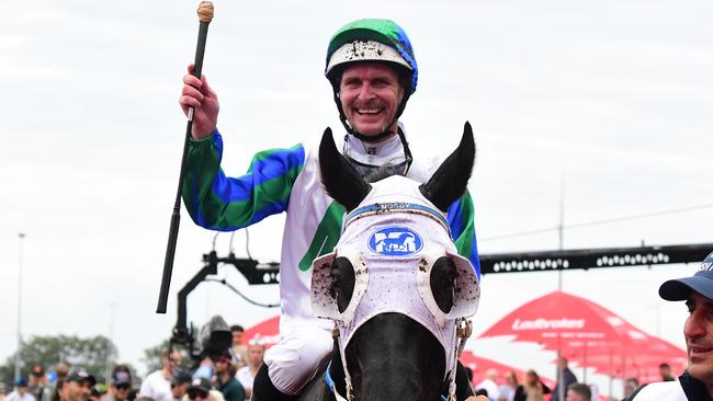 Trainer Katherine Coleman and Luke Nolen celebrate the win of I Wish I Win in the Kingsford Smith Cup. Picture: Grant Peters - Trackside Photography.