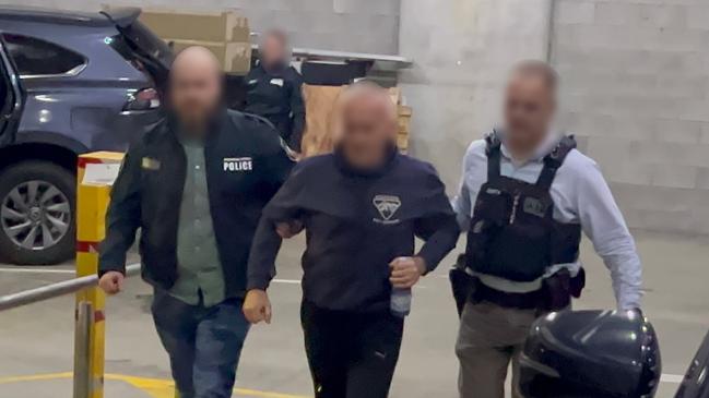 Two Russian-born Australian citizens accused of obtaining Australian Defence Force material to share with Russian authorities will face Brisbane Magistrates Court today after being charged with an espionage-related offence. Picture: Australian Federal Police