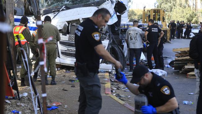 Police and officials at the site of the crash. Picture: Getty Images.