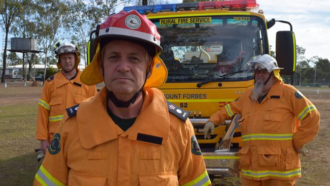 Queensland Rural Fire Service regional manager Superintendent Alan Gillespie (centre), with Mt Forbes Rural Fire Brigade members Jason Gillett (left) and Peter Ackerley.