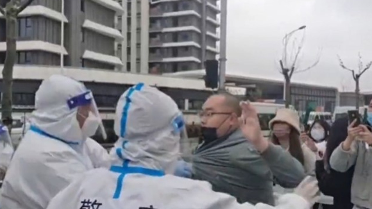 Last month, Shanghai residents shared footage of what they said was police ordering them to leave their homes so the buildings could be used for quarantine. Video: Jennifer Zeng/Twitter