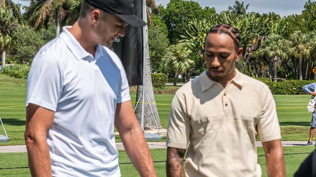 Mercedes' British driver Lewis Hamilton and NFL quarterback Tom Brady