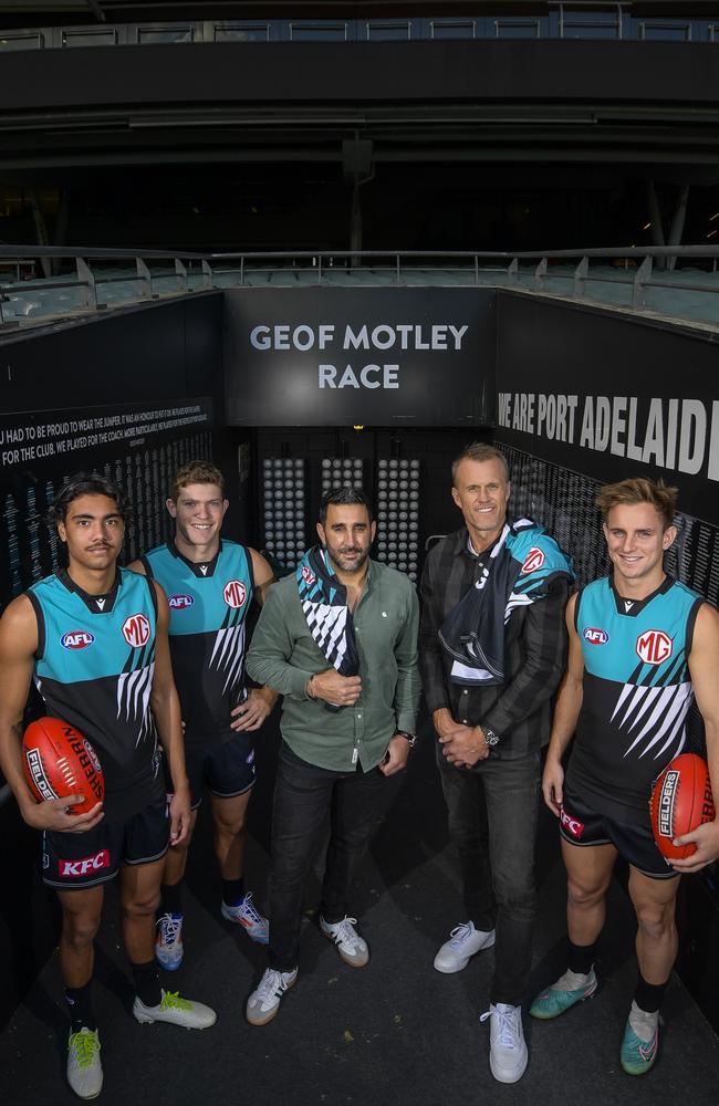 Current Port Adelaide players Jase Burgoyne, Mitch Georgiades and Jackson Mead with 2004 premiership stars Dom Cassisi and Dean Brogan, Picture: RoyVPhotography