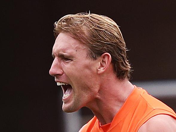 Giants Lachlan Keeffe celebrates kicking a goal during AFL match between the GWS Giants and Essendon at Giants Stadium. Picture. Phil Hillyard