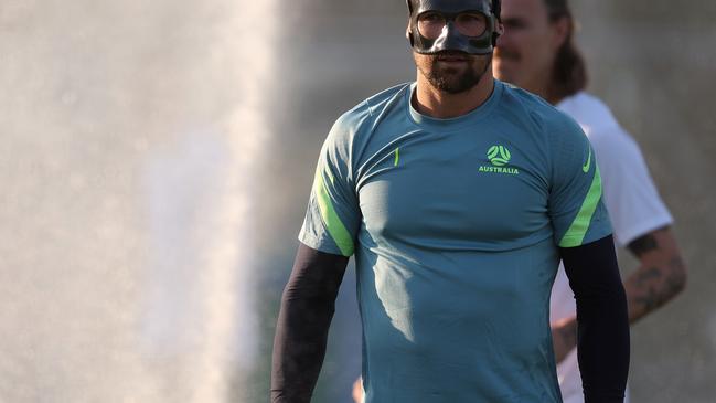 Socceroos captain Mat Ryan trains in a face mask in Doha. Picture: Robert Cianflone/Getty Images