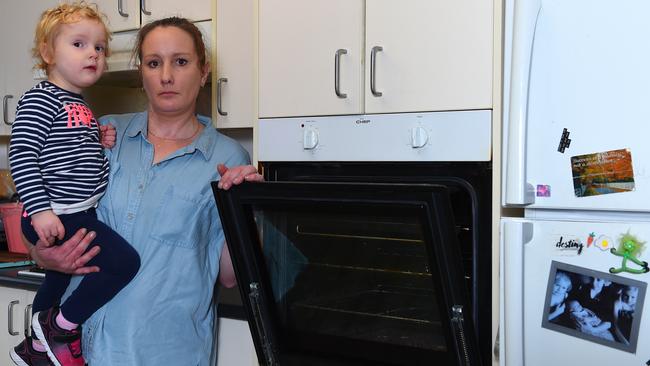 Wendy O'Brien, who lives in a Department of Human Services home, has been left without a working oven since November. Wendy with her daughter Piper, 2. <br/>Picture: Josie Hayden