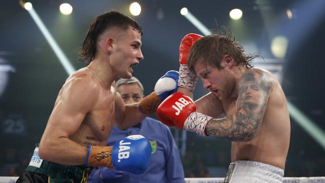 Harry Garside throws a punch during his Australian Lightweight Title bout with Layton McFerran as part of the King of the Castle Fight Night at Newcastle Entertainment Centre in May 2022. Picture: Getty Images
