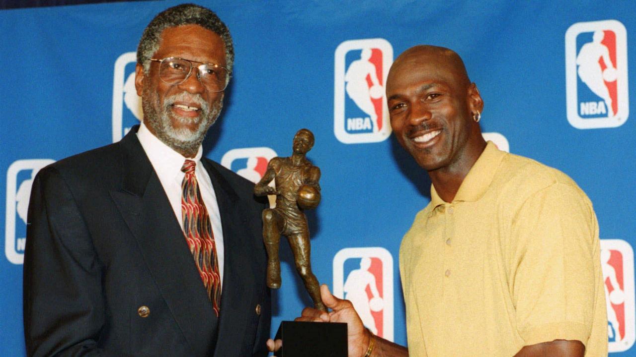 Jordan with his fifth MVP title in 1998, equalling and pictured with Russell. Photo: AP