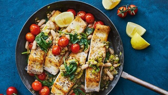 Fish with beans and tomatoes.