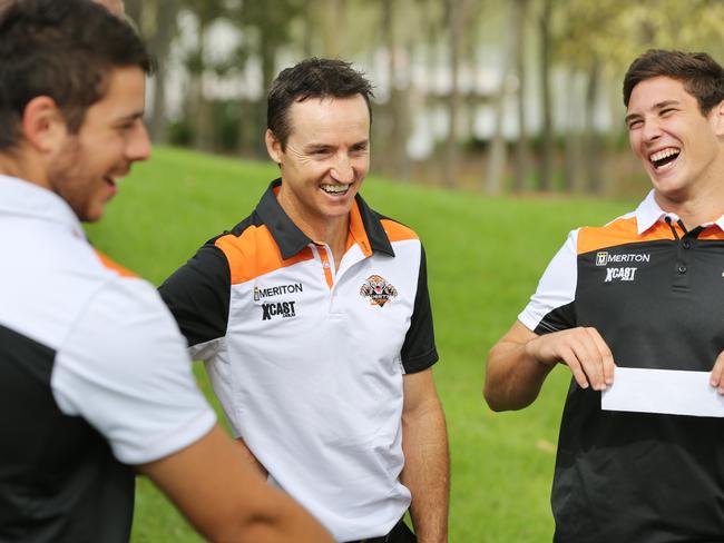 Wests Tigers coach Jason Taylor with some of his players. Wests Tigers season launch at Bicentennial Park, Homebush.