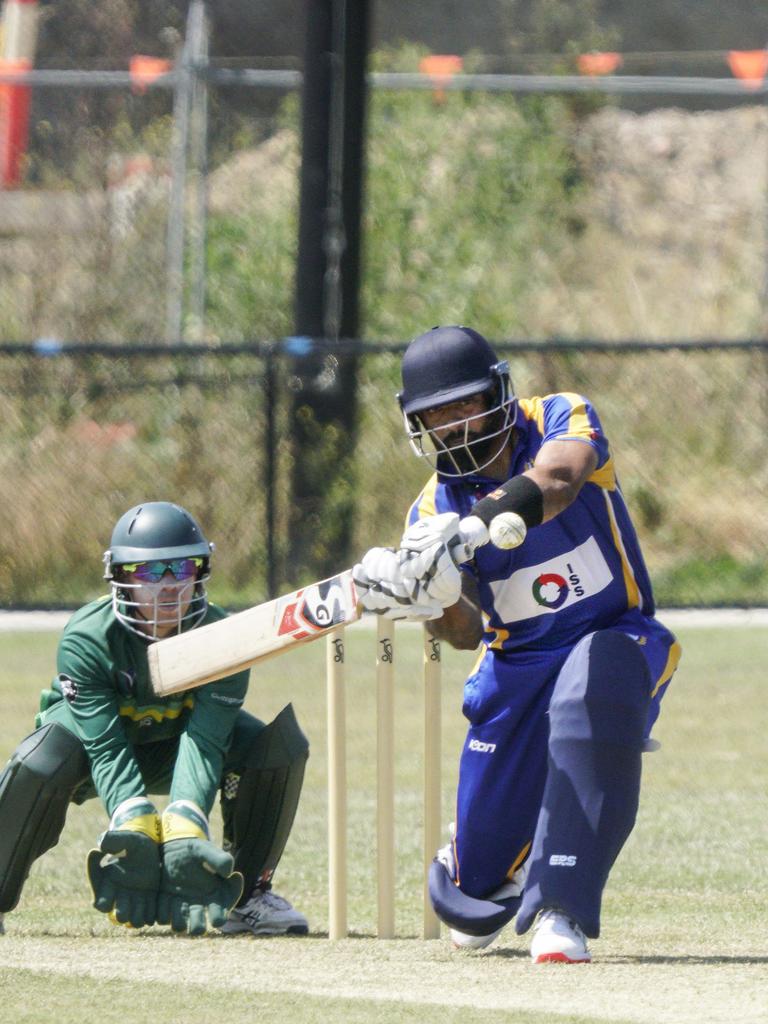 Noble Park batsman Gayan de Silva gets low. Picture: Valeriu Campan