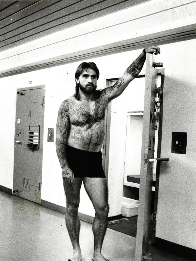 Convicted murderer John Lawrence Britten (aka Spike) pictured outside his cells in Yatala in 1988. Picture: Alex Massey