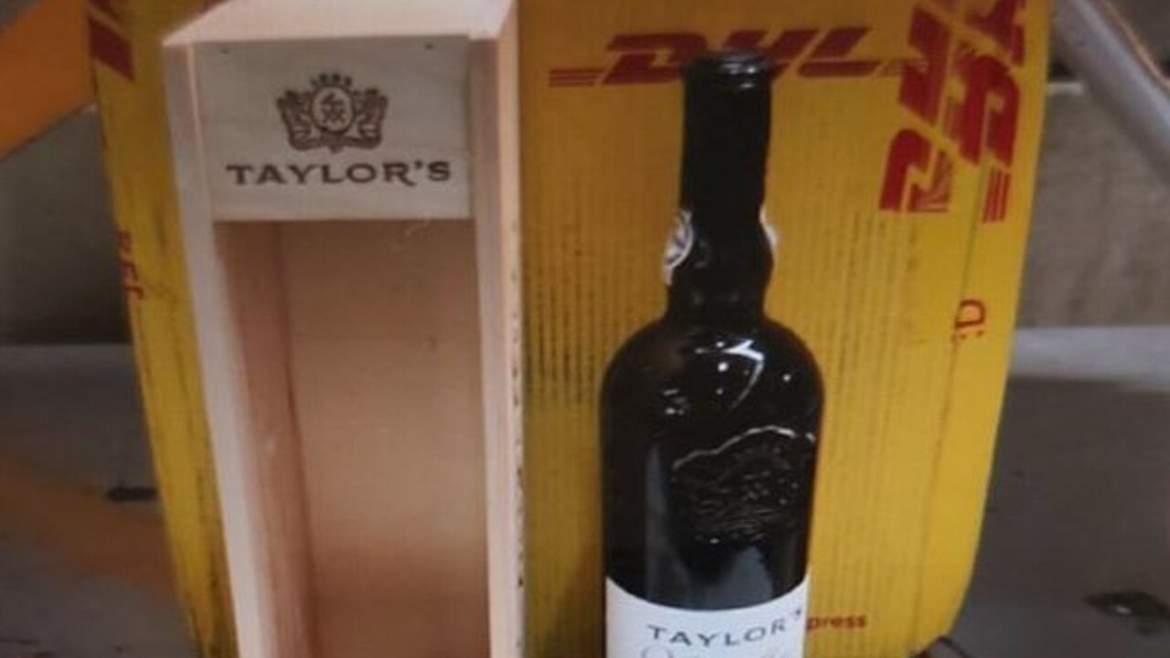 Redfern RES detectives have charged a man as part of ongoing investigations into the alleged importation of $675,000 worth of liquid MDMA concealed in wine bottles. Picture: NSW Police