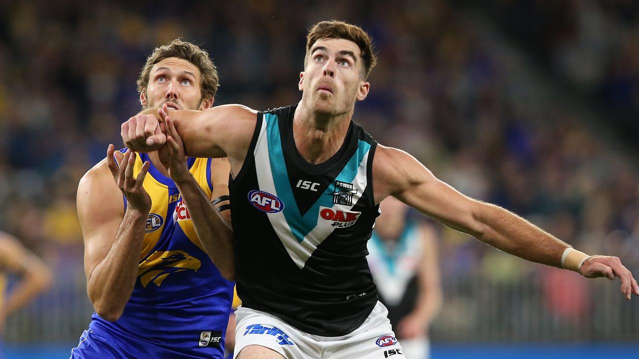 Tom Hickey of the Eagles and Scott Lycett of the Power contest the ruck during the round 5 AFL match. Picture: Paul Kane/Getty Images