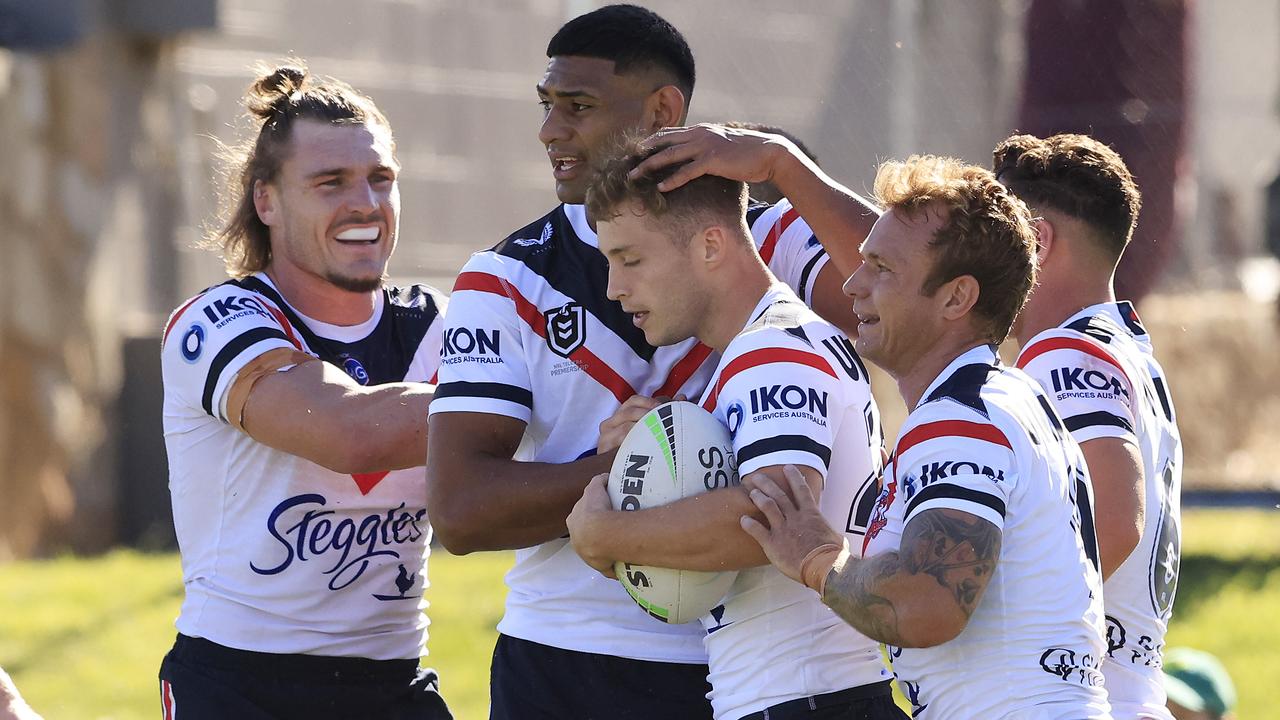 Sam Walker celebrates a try during the Roosters’ trial with Canberra