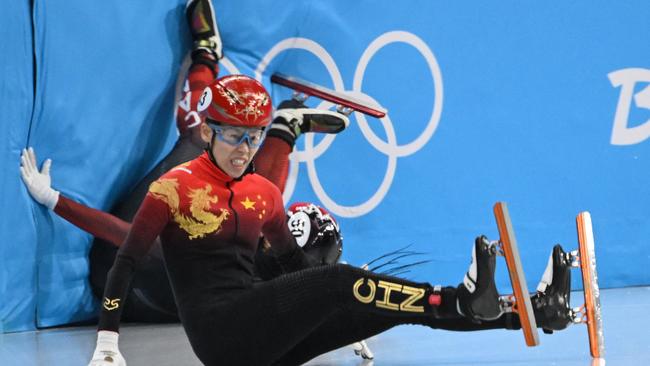 China's Fan Kexin falls in a quarter-final.