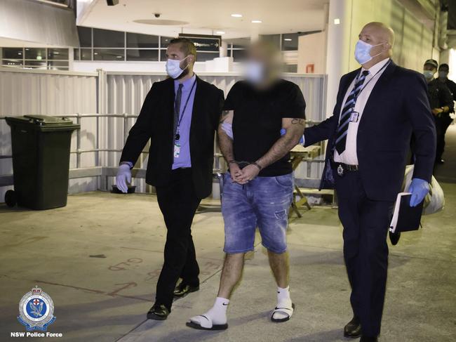 Matthew Battah pictured (centre) in 2022. Picture: NSW Police