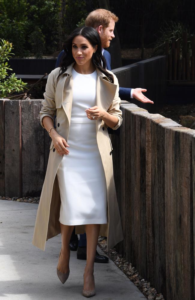 The Duchess of Sussex wearing the ivory shift dress from Sydney designer Karen Gee. Picture: AAP Image/Dean Lewins/POOL