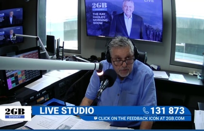 Ray Hadley makes his announcement in the studio. Picture: 2GB