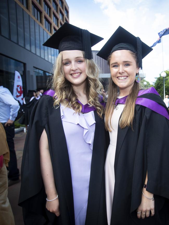 Elly O'Donnell and Hannah Coombe at UTAS graduations held at the Hobart Grand Chancellor. Picture: LUKE BOWDEN