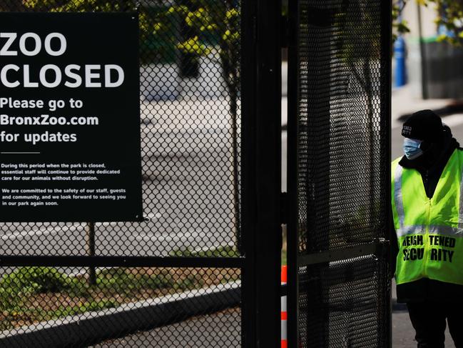 A guard stands at the entrance to the Bronx Zoo in New York City. Picture: AFP