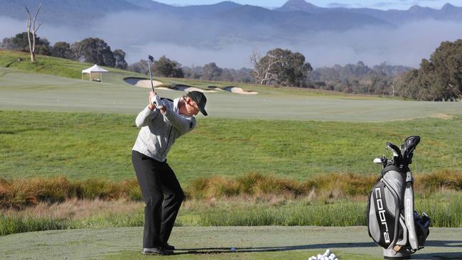 Greg Norman hits a few balls at the opening of the Cathedral Lodge golf course in 2017. Picture: David Crosling