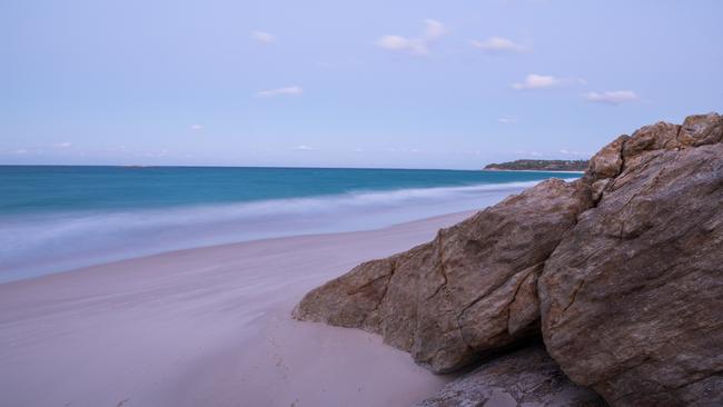 The beaches of North Stradbroke Island draw tourists from around the world.