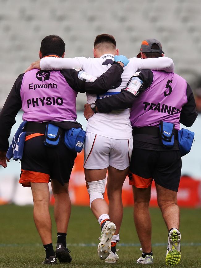 Coniglio was assisted from the field by two club staff. Picture: Getty Images