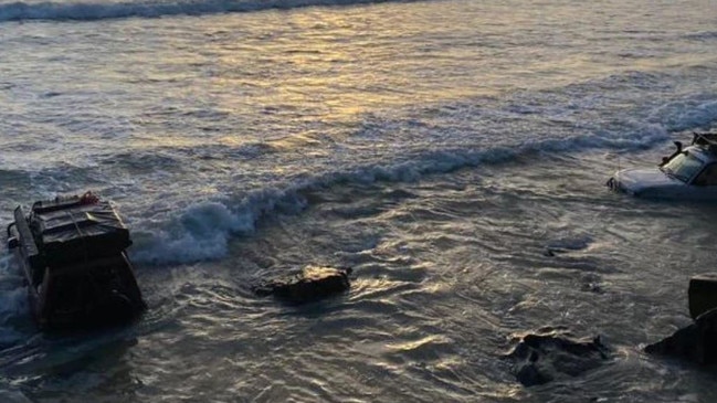 Car stuck in water at Rainbow Beach. Picture – Facebook/Ice Man.