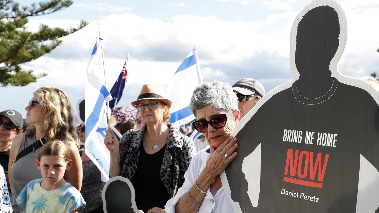 Robyn Shatenstein who’s cousin, Daniel Peretz a tank commander was captured by Hamas, at a Jewish event at Bondi Beach being held by family and friends of hostages held by Hamas. Picture: Jonathan Ng