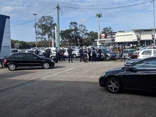 A MAN has been apprehended after leading police on a wild chase along Nicklin Way this afternoon before crashing outside a local business. Video James Nice 