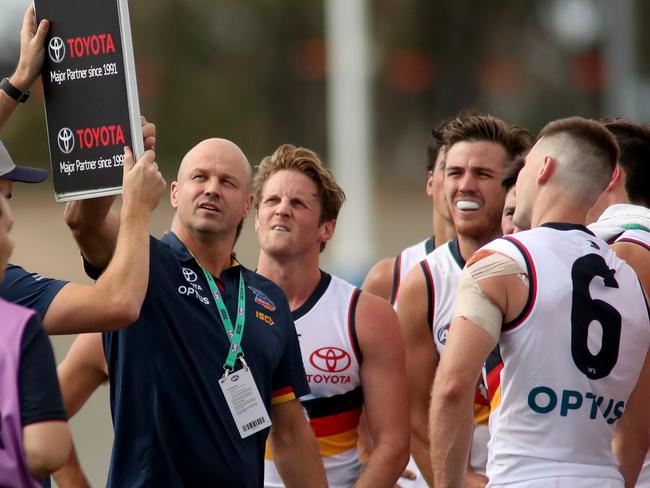 Adelaide Crows coach Matthew Nicks speaks to his players during the AFL Marsh Community Series pre-season match between the Adelaide Crows and the Gold Coast Suns at Hickinbotham Oval in Adelaide, Friday, March 6, 2020. (AAP Image/Kelly Barnes) NO ARCHIVING, EDITORIAL USE ONLY