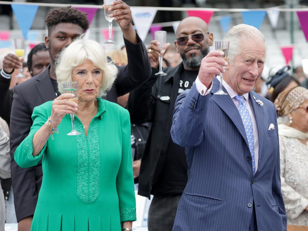 Camilla, Duchess of Cornwall and Prince Charles, Prince of Wales cheers with glasses of champagne at the Big Jubilee Lunch at The Oval in London, England. Picture: Getty Images