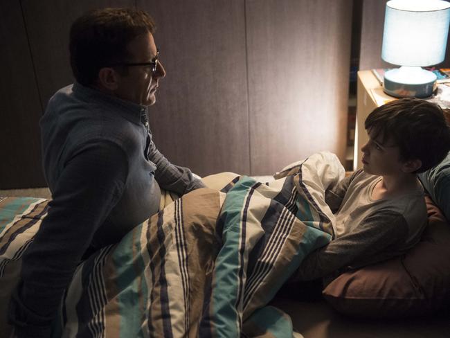 Jason Isaacs, as Michael Carter, with Levi Miller (Mick) in a scene from Red Dog: True Blue. Picture: Roadshow Films