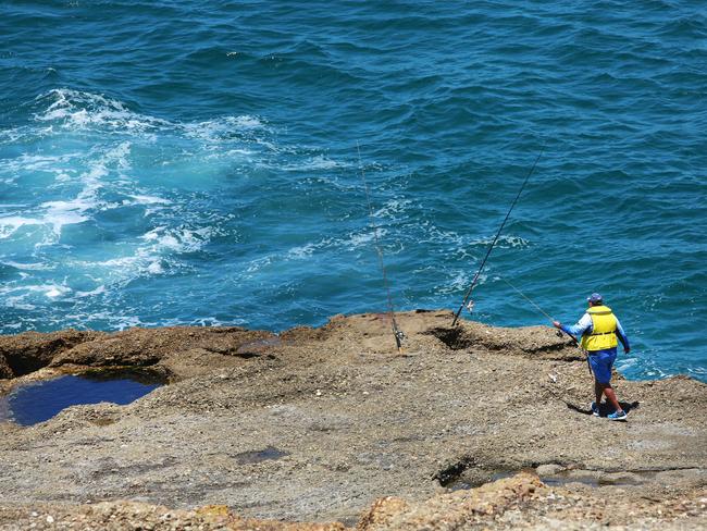 Fisherman in lifejacket at Snapper point on a good day at the Central Coast pictured on Friday 5th January 2018 after drownings in the last few days at Snapper Pt..(AAP Image/Sue Graham)