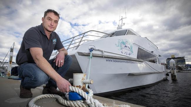 Cuttlefish skipper Ben Dawe of Tasmanian Wild Seafood Adventures at Hobart after the New Zealand travel bubble was suspended. Picture Chris Kidd