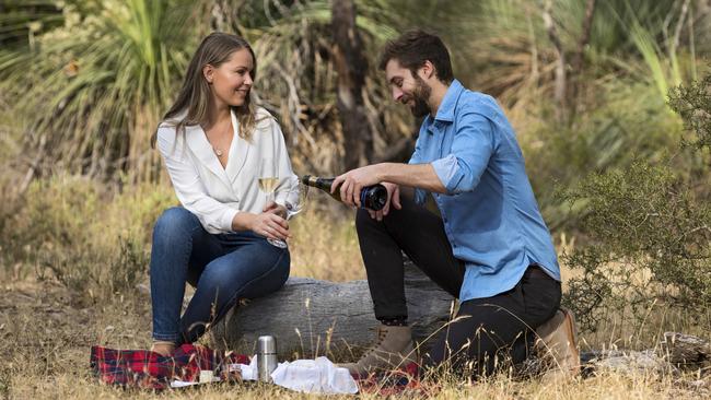 A couple enjoys a Breakfast with Kangaroos experience in Barossa Valley. Picture: John Montesi