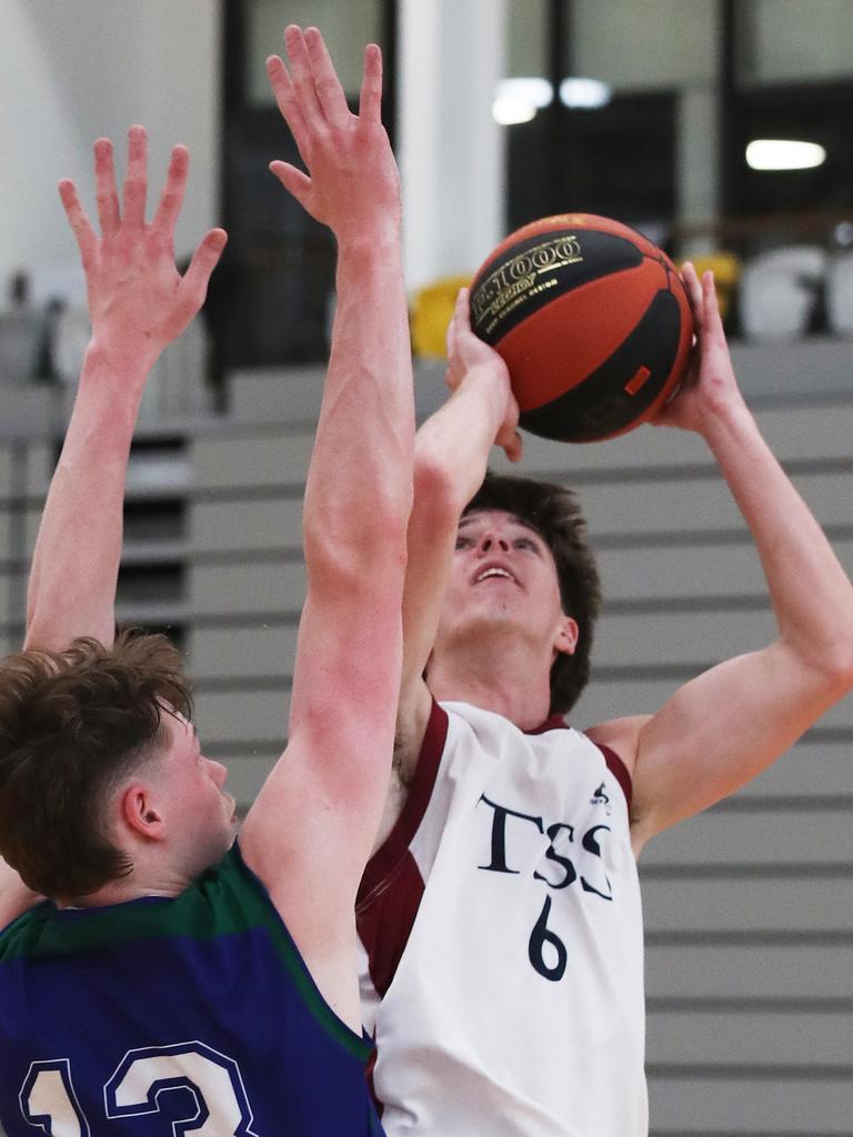 Basketball Australia Schools Championships at Carrara. Mens open final, Lake Ginninderra College Lakers V TSS (in white). the Lakers defence gave Benjamin Tweedy from TSS special attention in the final. Picture Glenn Hampson