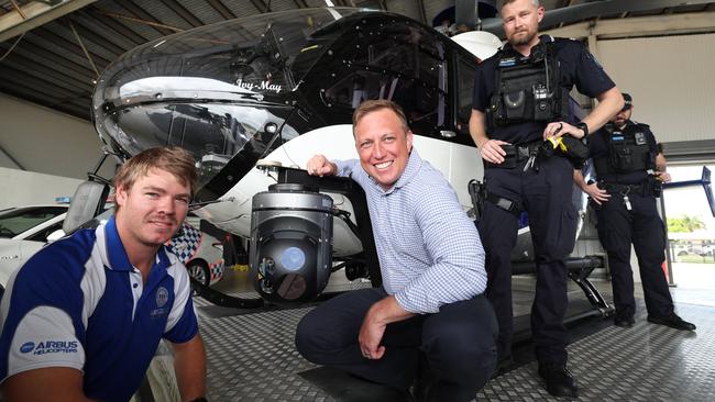 Premier Steven Miles in Townsville with the new Police Helicopter at Townsville Airport. With Jake Keir Cam surveillance operator. Pic Annette Dew