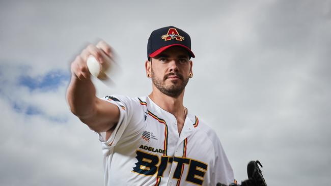 New Adelaide pitcher Todd McDonald warms up at West Beach Baseball headquarters. Picture: MATT LOXTON