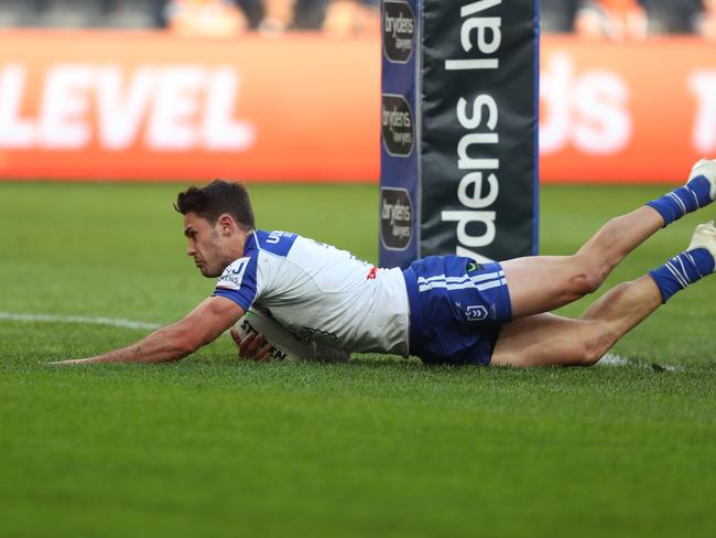 Bulldogs Nick Meaney scores a try during the Wests Tigers v Bulldogs NRL match at Bankwest Stadium, Parramatta. Picture: Brett Costello