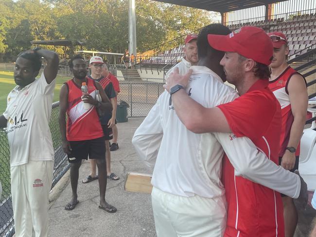 Waratah captain Isaac Conway and Ash Chandrasinghe embrace after their 240-run partnership against Tracy Village in 2022. Picture: Ben Cameron.