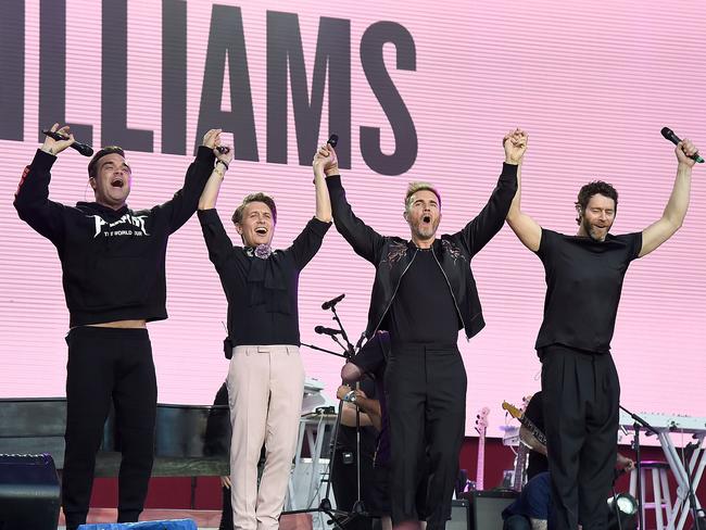 Robbie Williams with Howard Donald, Gary Barlow and Mark Owen of Take That on stage during the One Love Manchester Benefit Concert at Old Trafford on June 4, 2017 in Manchester, England. Picture: Kevin Mazur/Getty Images for One Love Manchester