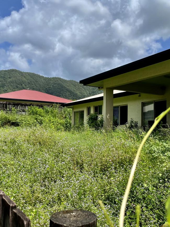 Weeds have begun to take over the backyard of the Cadell St property. Picture: Peter Carruthers