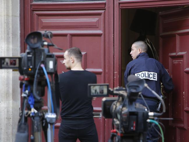A French police officer enters the Paris residence of Kim Kardashian West on October 3, 2016. Picture: AP