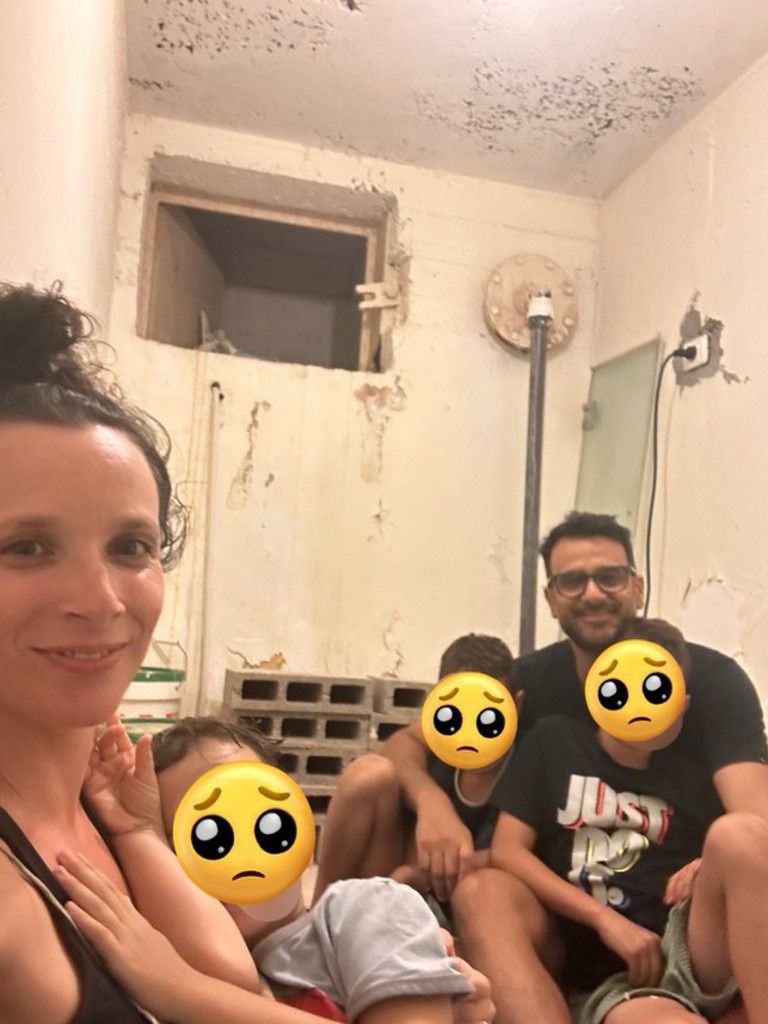 Aussie expat Emily Gian who has been living with her family in Yehud, about 18km from Tel Aviv, for the past three months, pictured in a bomb shelter. Picture: Twitter @emilygian