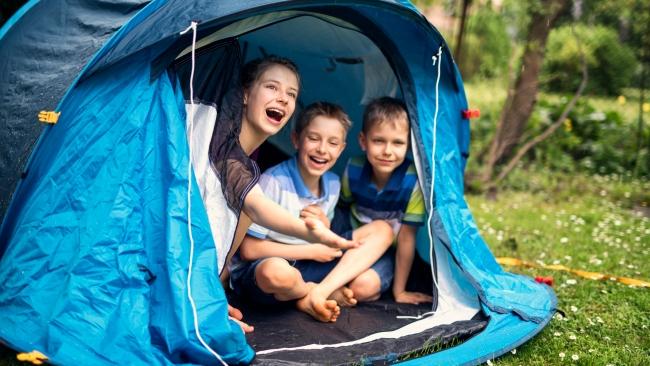 Camping out is a popular adventure for kids.