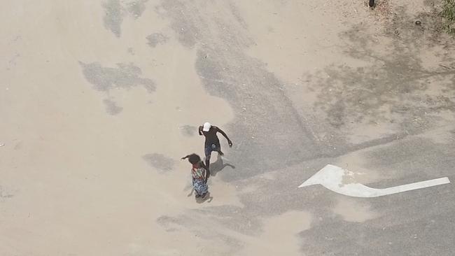 A brutal assault has been captured by a drone pilot at Buffalo Creek, north of Darwin. Picture: SUPPLIED