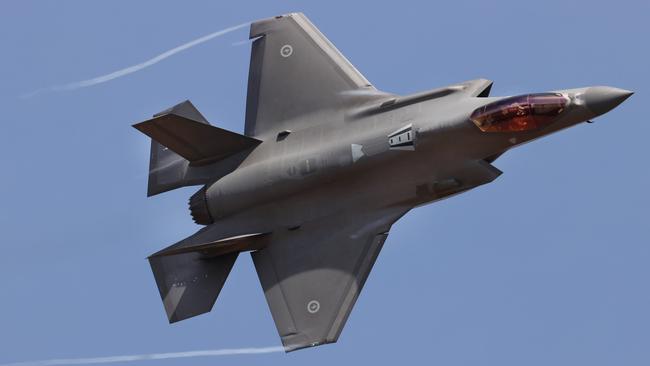 A RAAF F-35A fighter jet in action. The jets rely on encrypted communications to send and receive massive amounts of data. Picture: David Caird